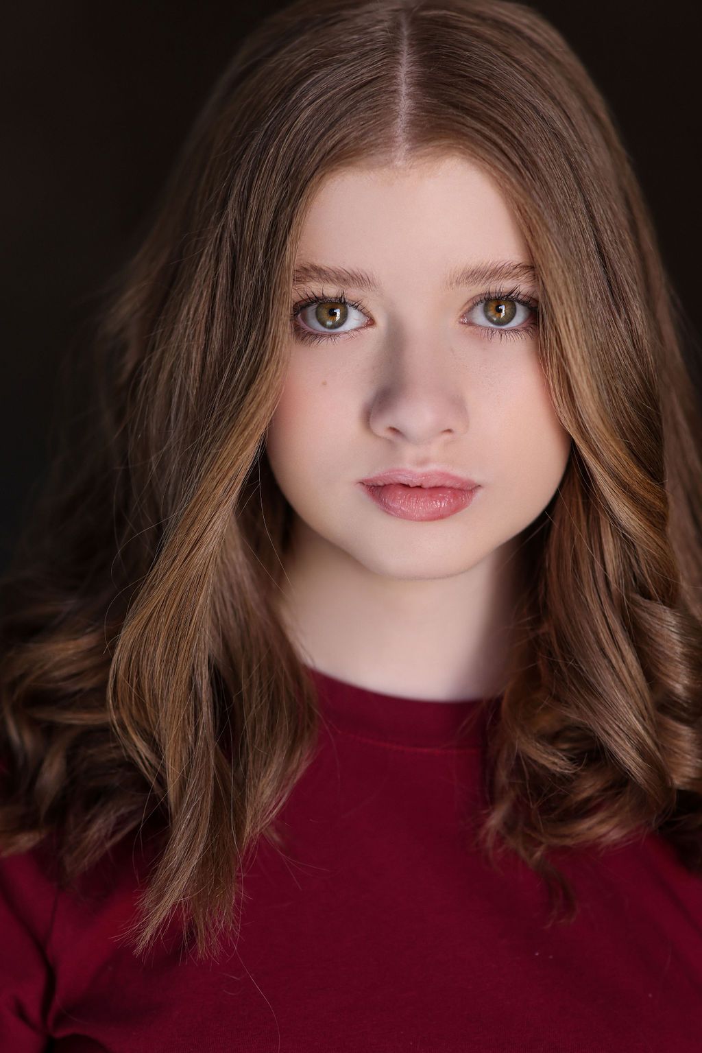 Parker Pitt, actor, headshot in a deep red top by Lilly K Photography