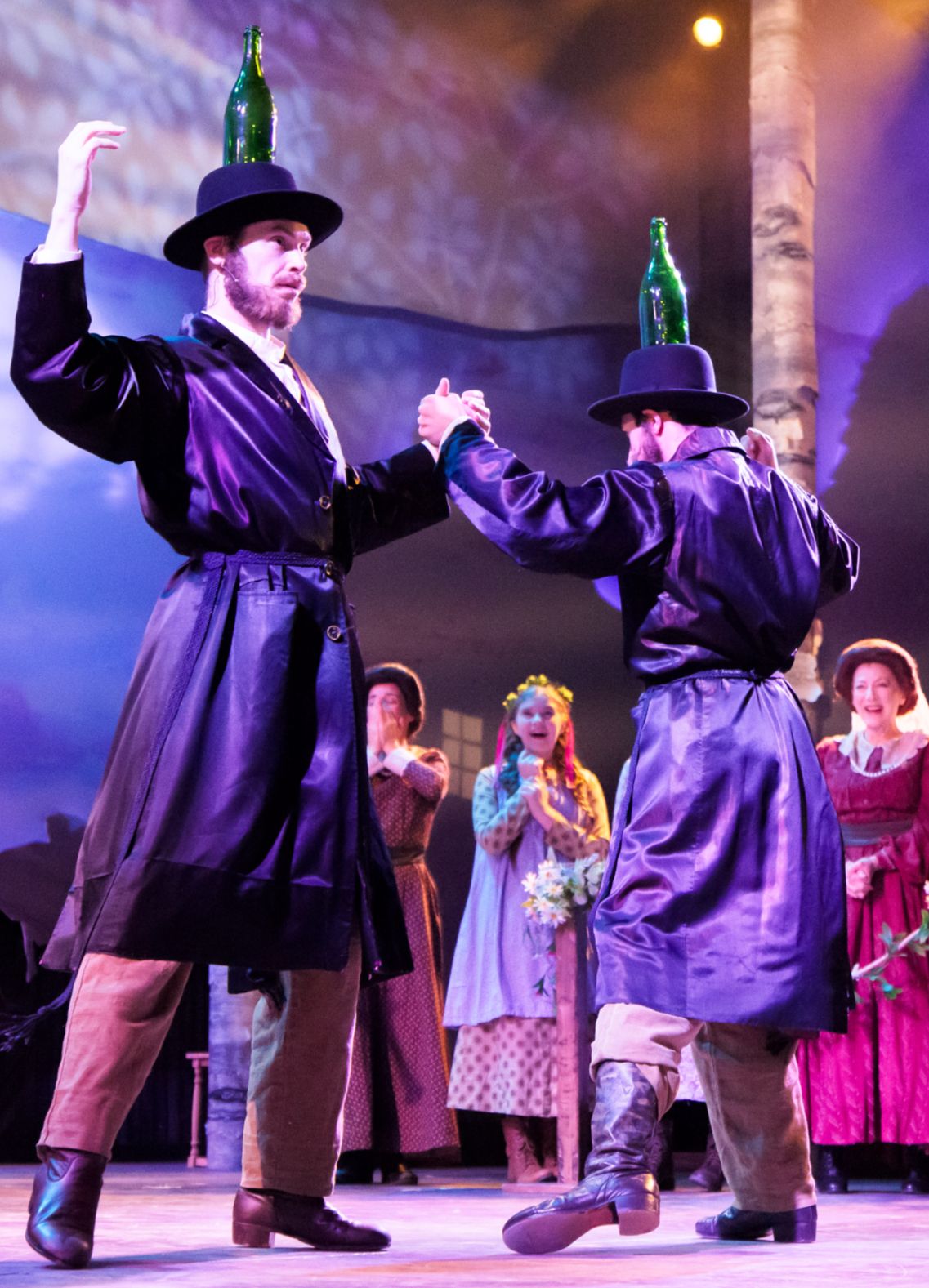 Parker Pitt as Bielke watching “The Bottle Dance” at the wedding in Fiddler on the Roof at The Phoenix Theatre Company