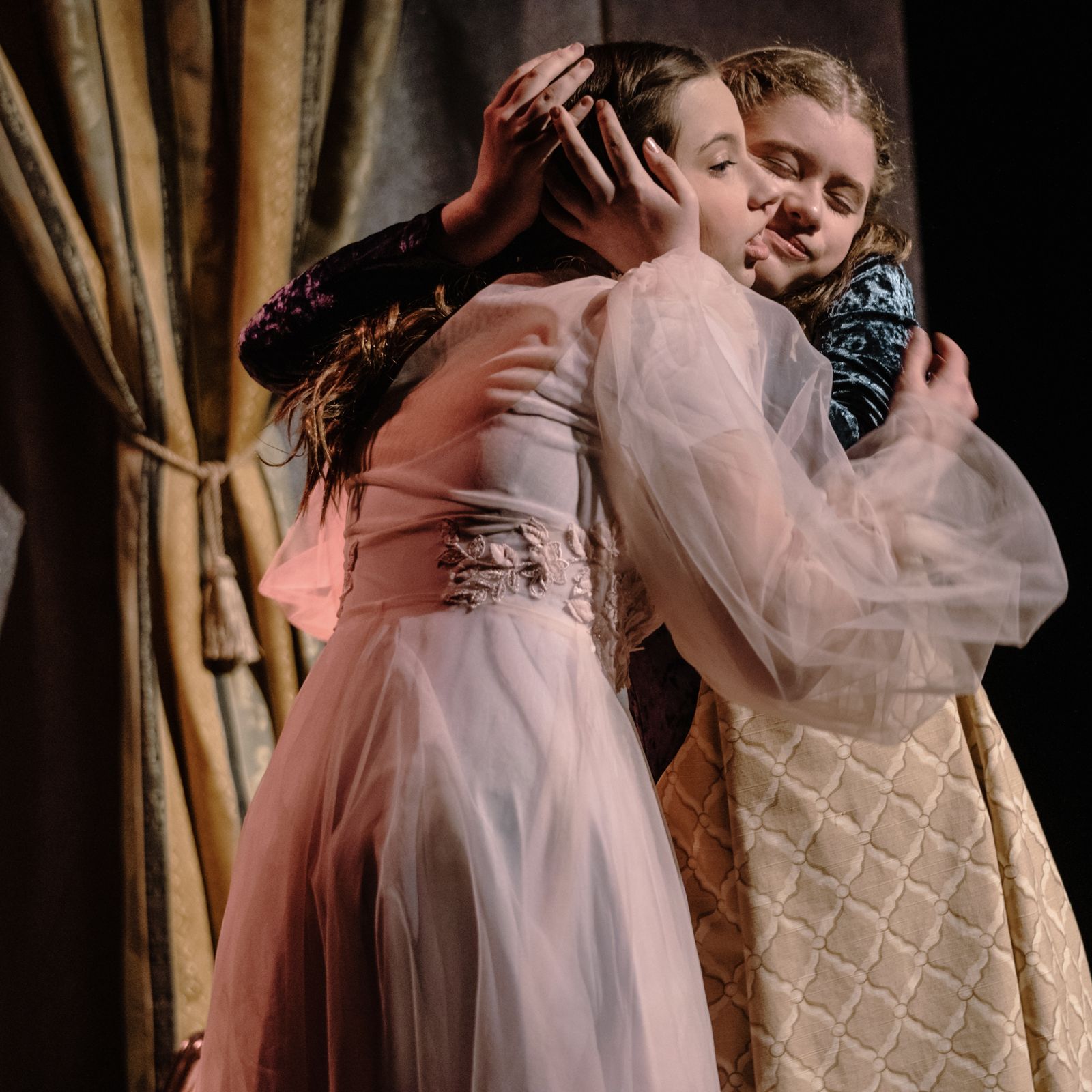 Parker Pitt as Emilia embracing Beauty in the ballet Sleeping Beauty at Valley Youth Theatre