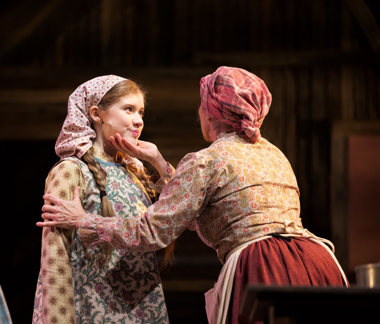 Parker Pitt as Bielke with her mother Golde in Fiddler on the Roof at The Phoenix Theatre Company