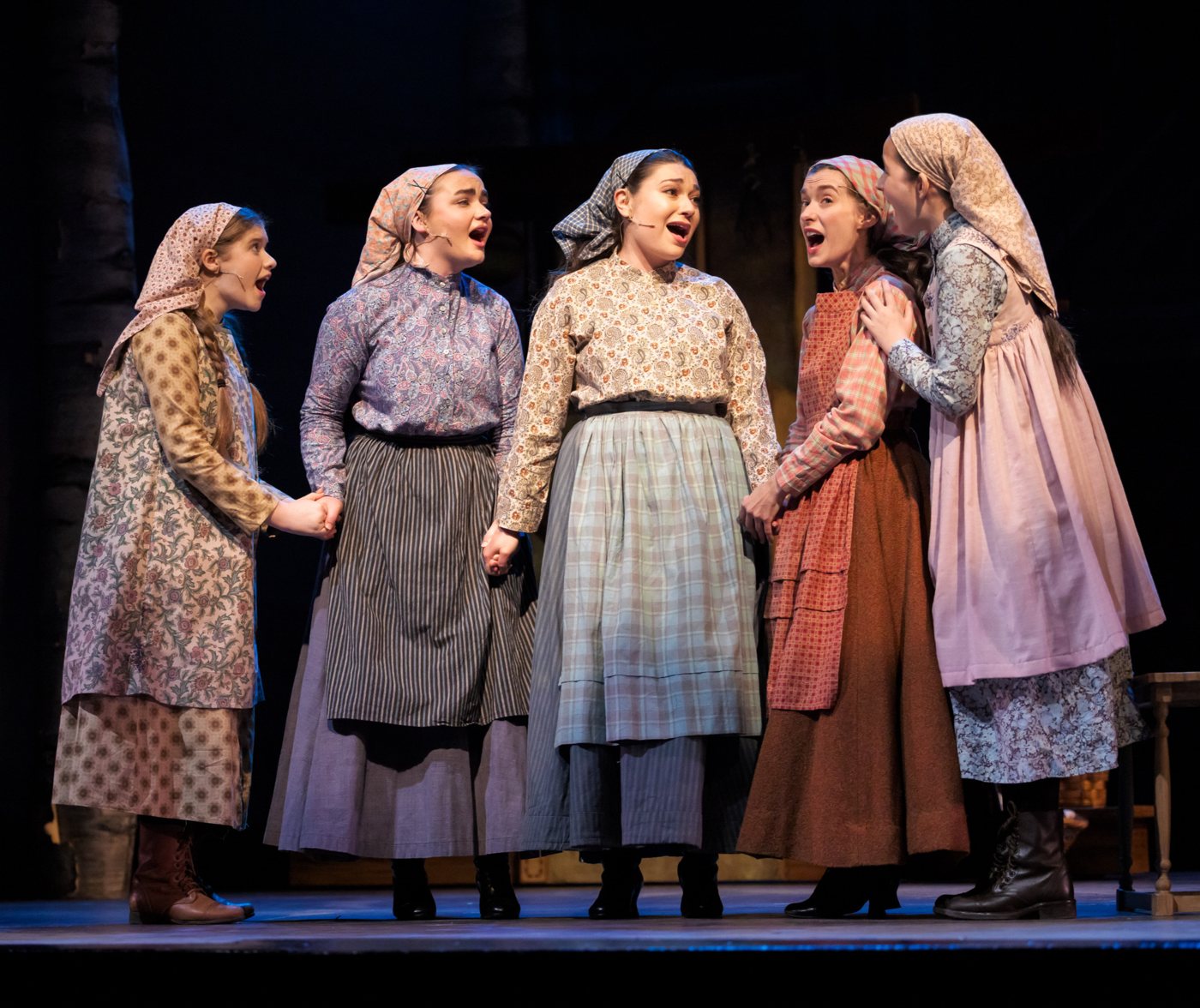 Tevye’s daughters, including Parker Pitt as Bielke, sing “Matchmaker, Matchmaker” in Fiddler on the Roof