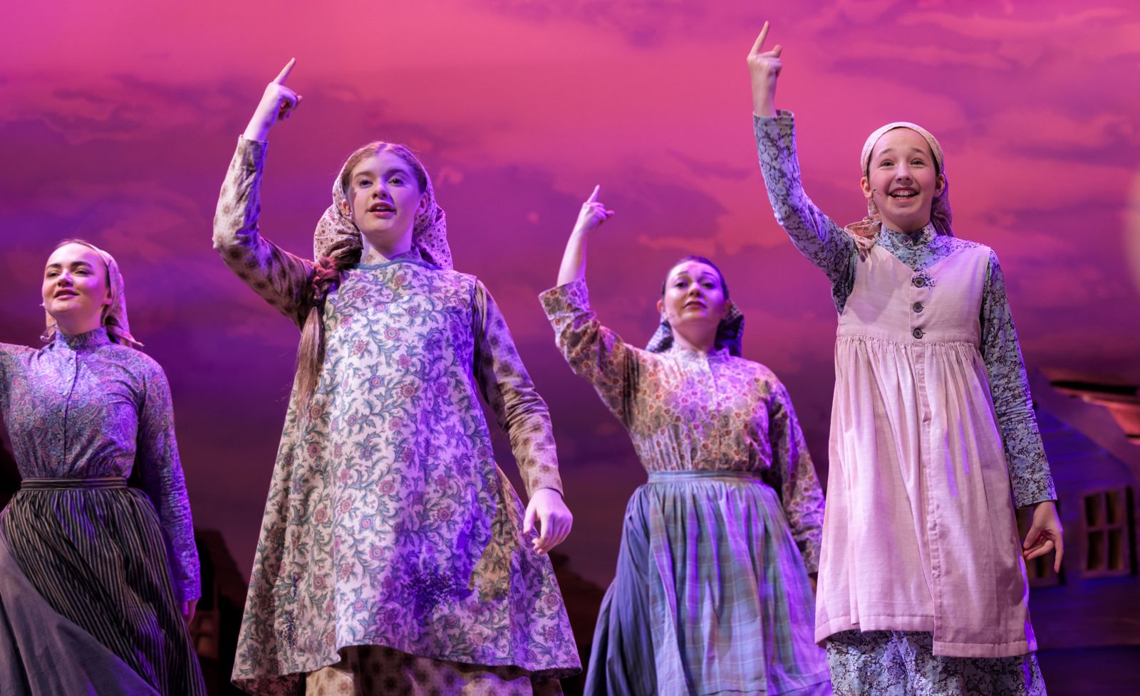 Parker Pitt as Bielke with her sisters singing “Tradition” in Fiddler on the Roof at The Phoenix Theatre Company