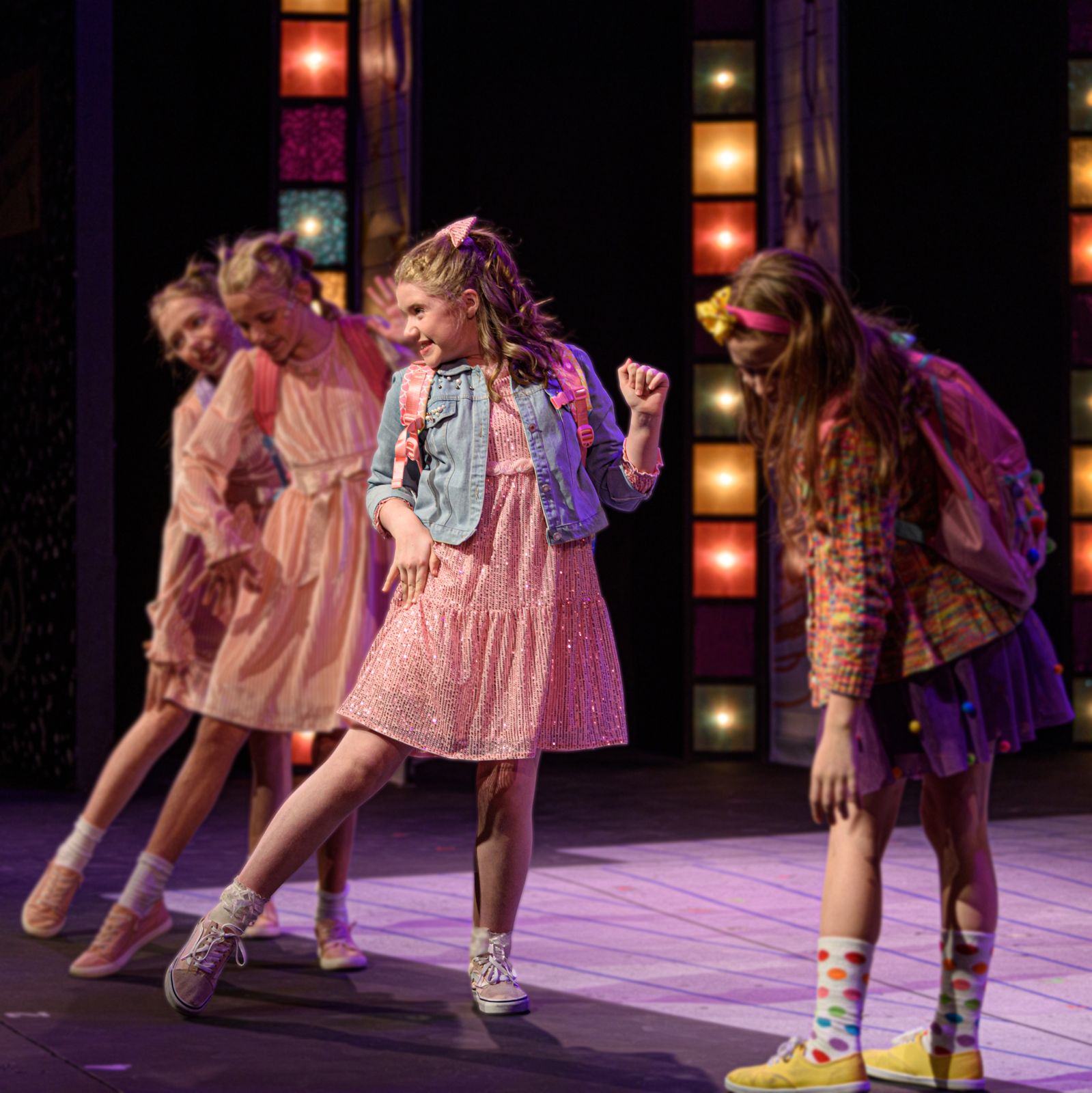 Parker Pitt as Lucille dancing with her friends in Junie B. Jones the Musical at Valley Youth Theatre