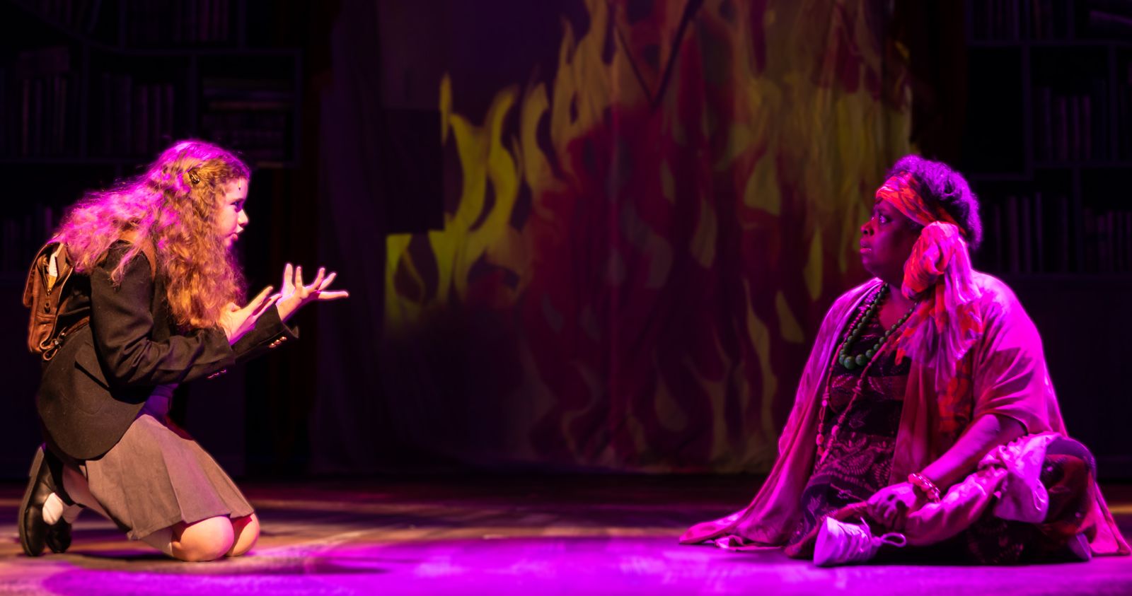 Parker Pitt as Matilda acting out a story for Mrs Phelps in Matilda the Musical at TheaterWorks