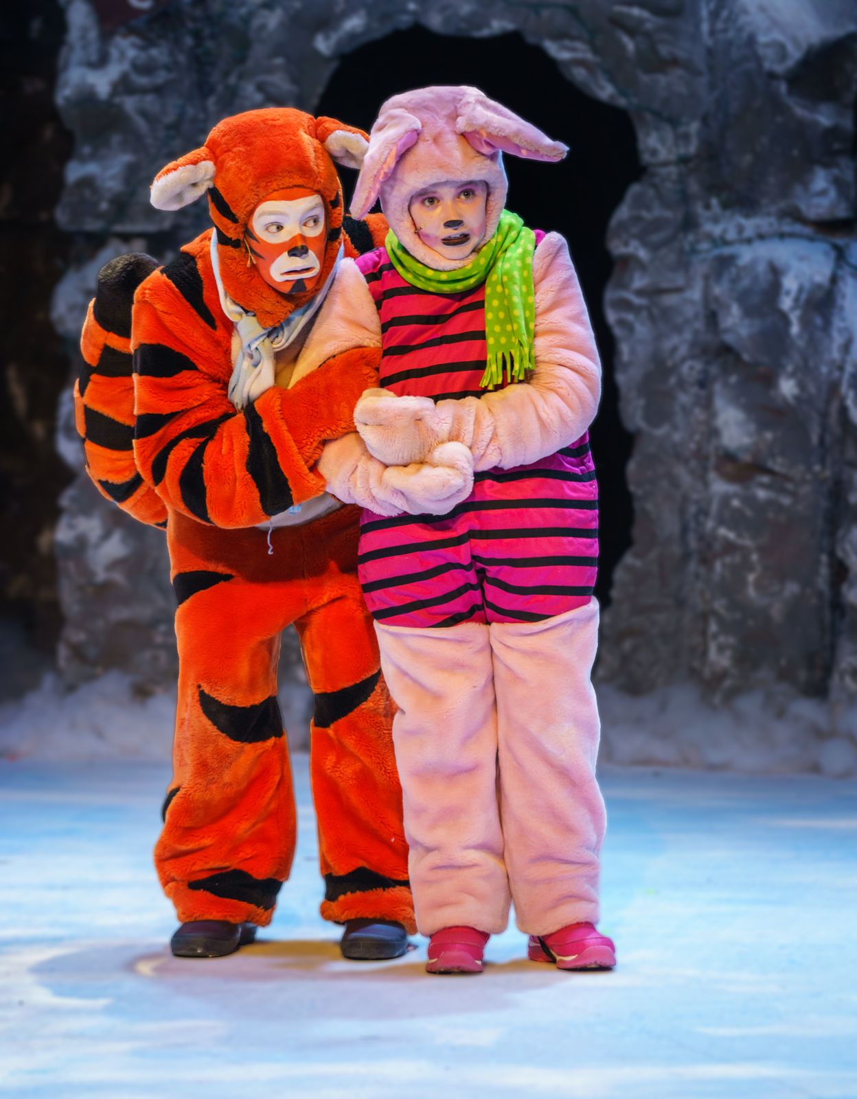 Parker Pitt as Piglet crouching with Tigger behind her in A Winnie the Pooh Christmas Tail at Valley Youth Theatre