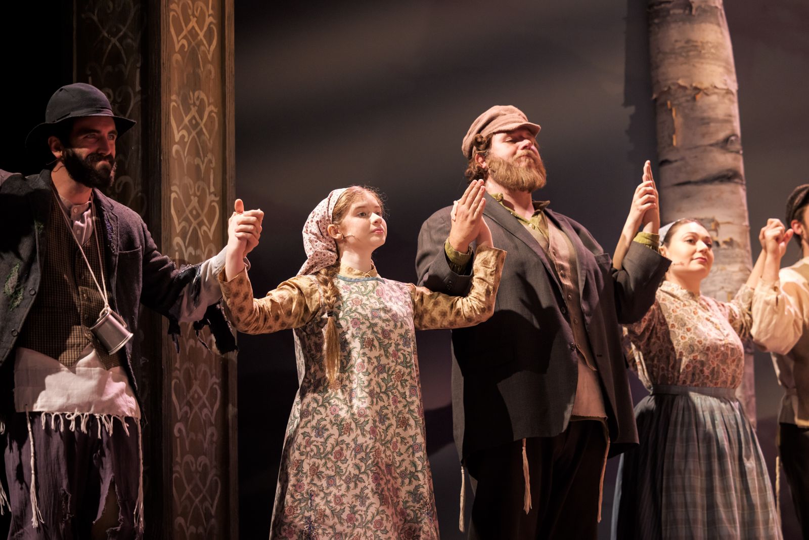 Parker Pitt dancing with the villagers in the opening number “Tradition” in Fiddler on the Roof at The Phoenix Theatre Company